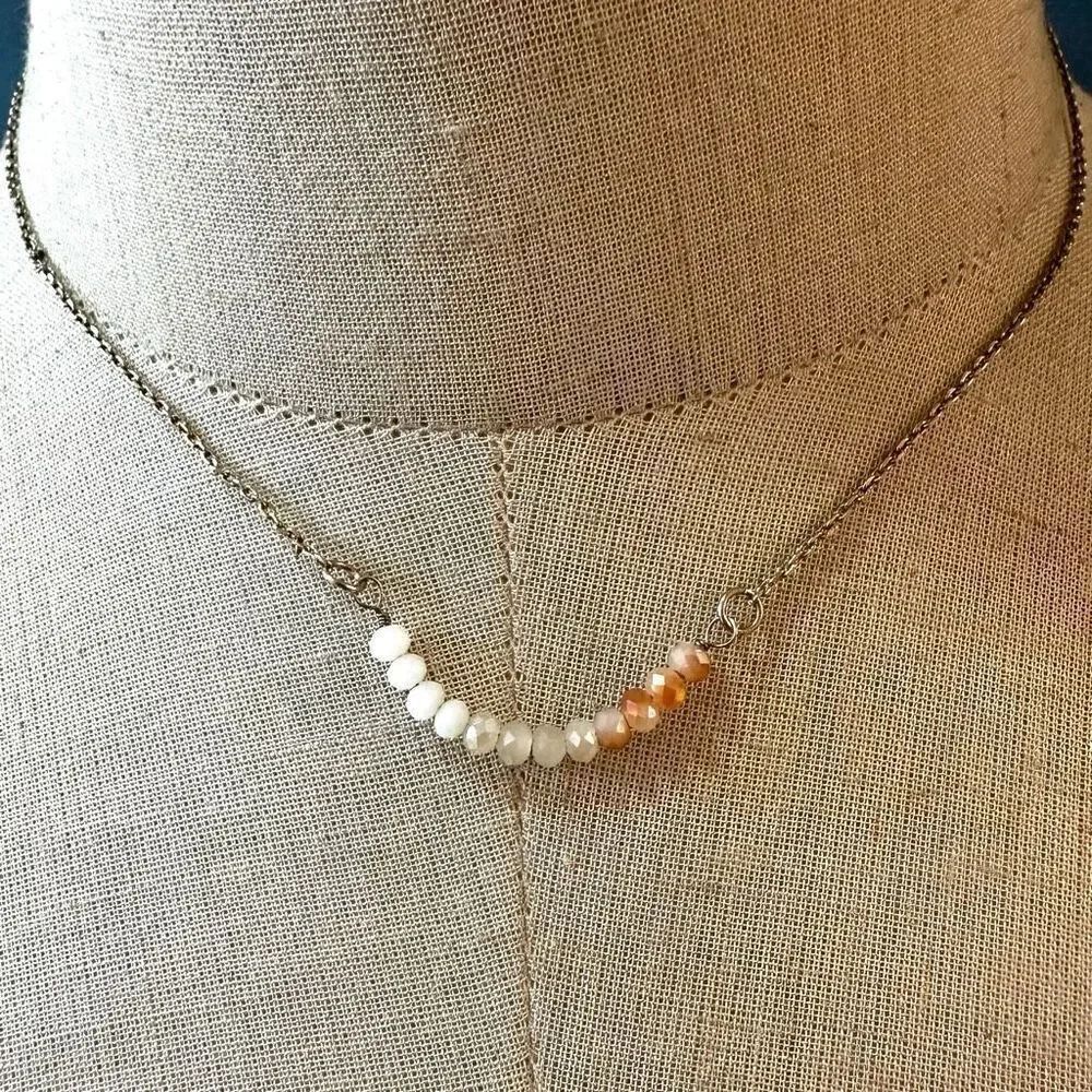 Gold tone beaded necklace
